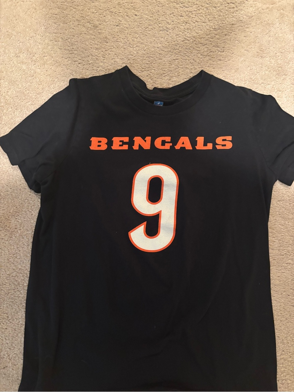 NFL Black Tee with Small Shield Logo